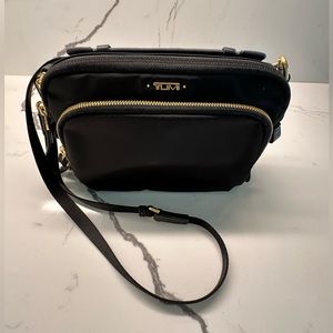 Genuine TUMI cross-body travel bag